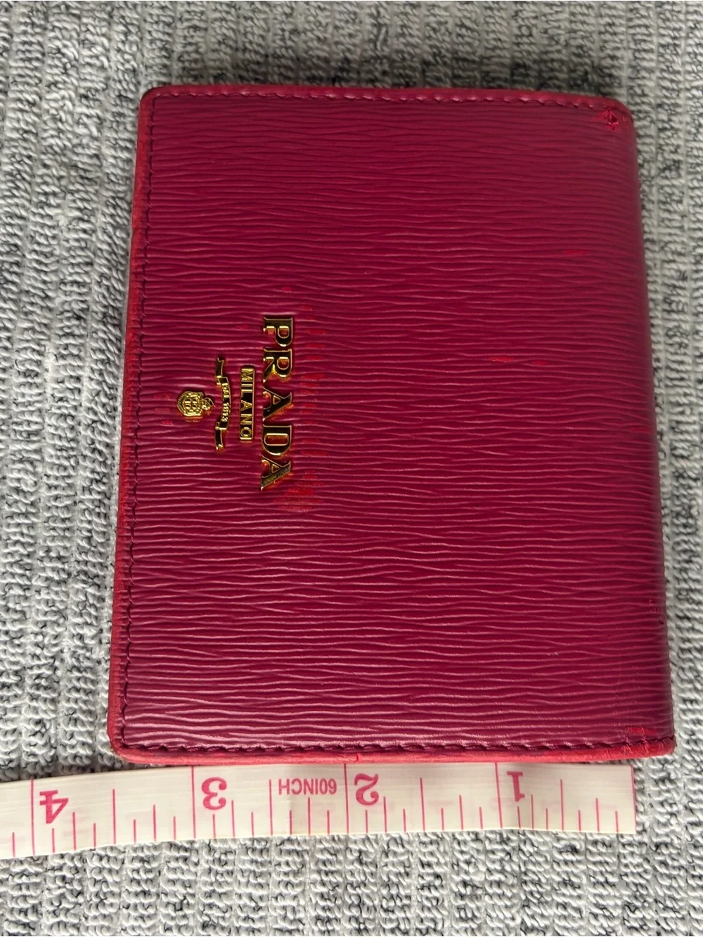Authentic Prada Saffiano Leather Compact Wallet in deep red/berry/magenta color